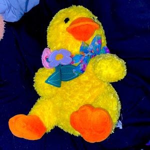 Stuffed Duck Holding Flowers